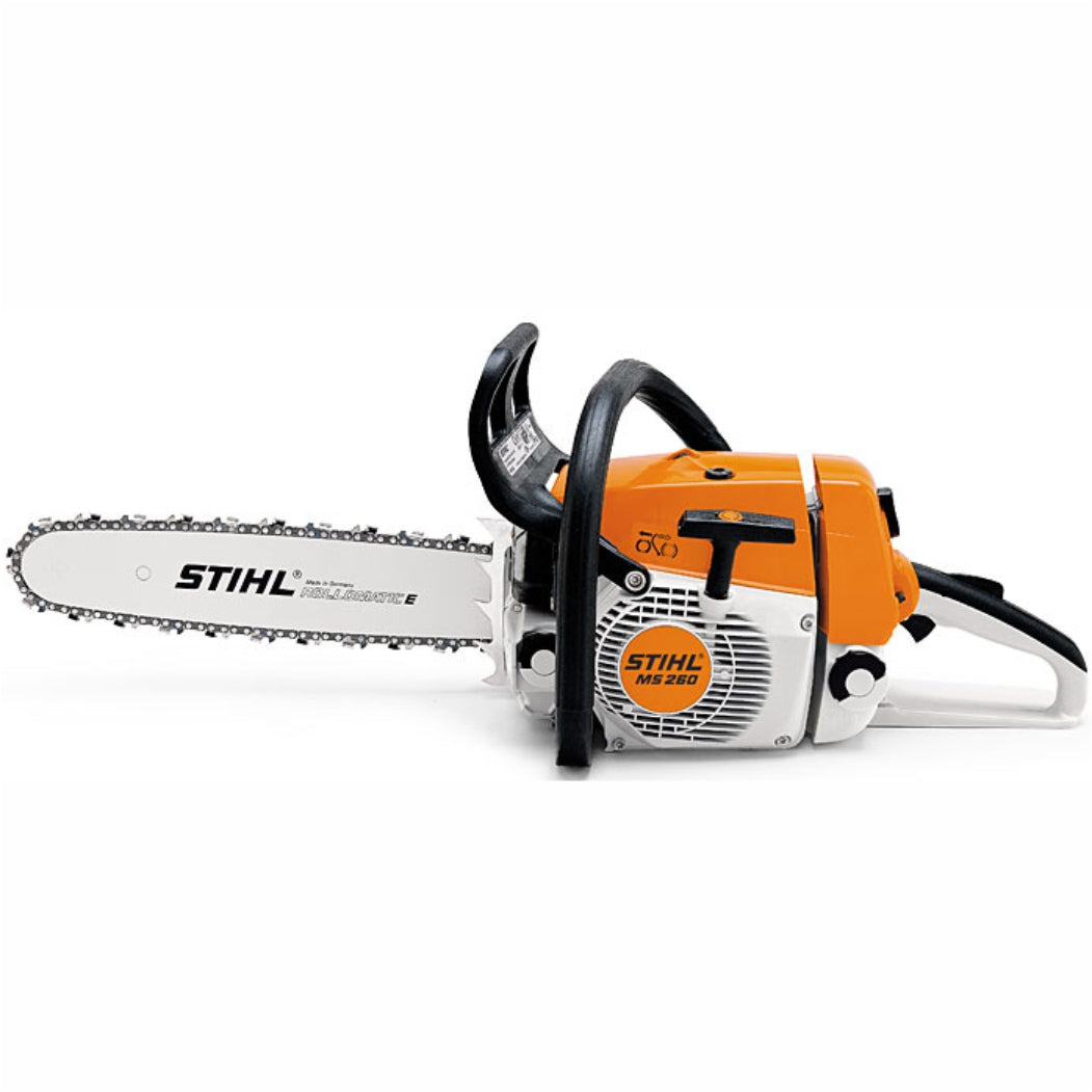 Operator cutting firewood with Stihl MS 260 chainsaw